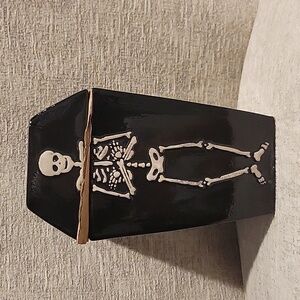 Skeleton candy jar. 4.29" x 3.86" x 7.24". New